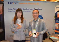 Min Cui and Zhaobin Han with Elitech show different temperature data loggers. 